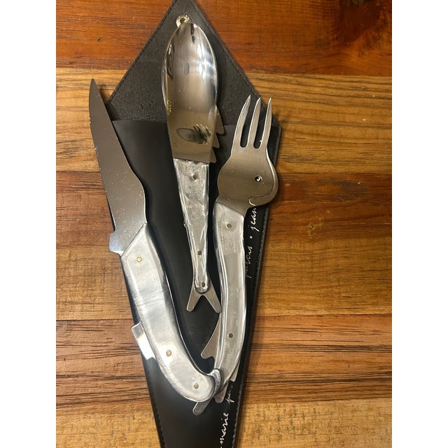 Up for sale is an incredibly rare, museum-quality 12-piece post-modern flatware set designed by Jean-Marie Patois (France,...