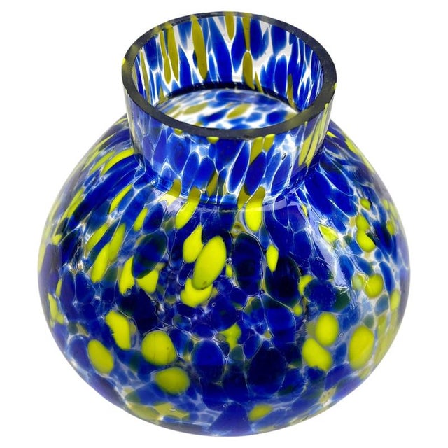 Dramatic multi color decor, cobalt and yellow in hand blown splatter glass vase in the Art Deco style. This design for...