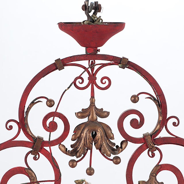 This elegant French chandelier, dating to circa 1945, is crafted from hand-forged painted iron with a striking scrolling...