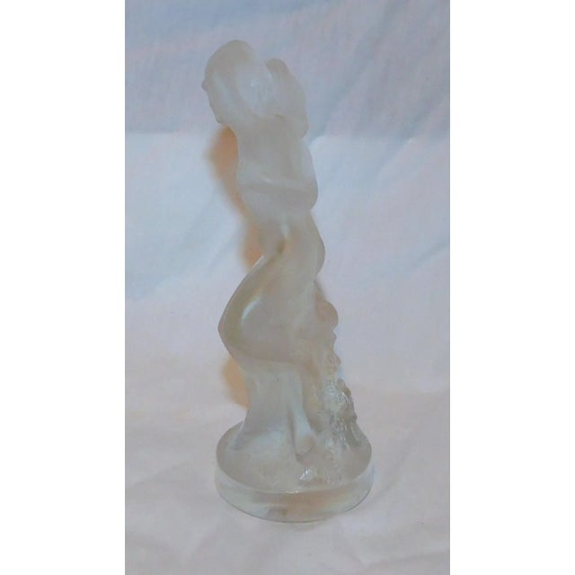 Classic Art Deco Lalique figurine of a woman and a faun, entitled, "Le Faune". Signed "Lalique" on underside. Perfect to...