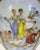 10.5” high, a very scarce Royal Vienna chocolate pot featuring a scene of GrecoRoman women as artists and sculptor with...