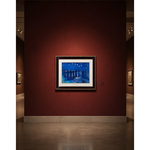 Framed Vincent Van Gogh “Night Stars” reproduction print featuring deep blue nighttime tones, glowing star reflections, a...