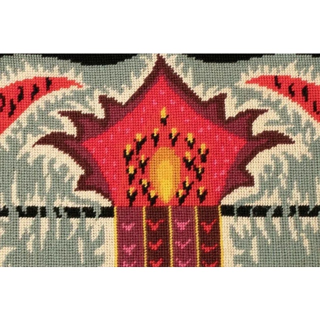 H: 78.5cm w: 113.5cm d: 4cm a large framed hand made needle point tapestry depicting two birds.