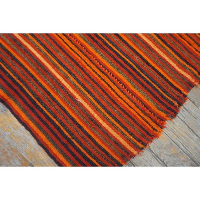 "This is a vibrant and highly authentic vintage mid-century Turkish Kilim, dating back to circa 1950. Measuring a very...