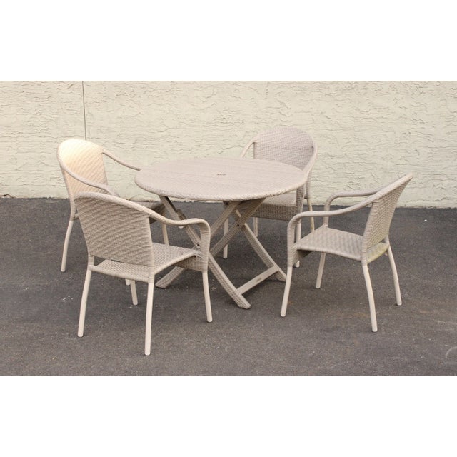 High Quality Set of Four Aluminum Frame And All Weather Wicker Stackable Armchairs and Folding Dining Table