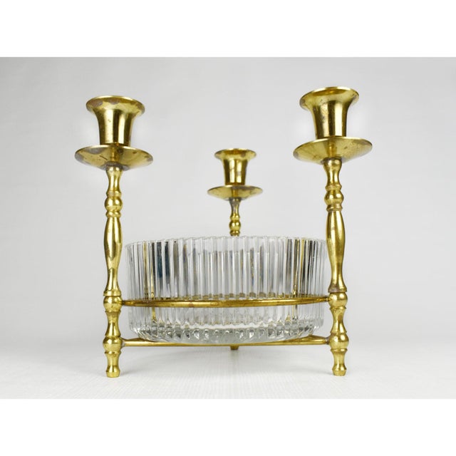 This elegant Vintage Teleflora Brass Trio Candle Holder is a versatile centerpiece that effortlessly blends Mid-Century...