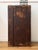 A perfectly rustic 19th century Irish cupboard. In its original warm, reddy brown paint. with excellent dimensions for...