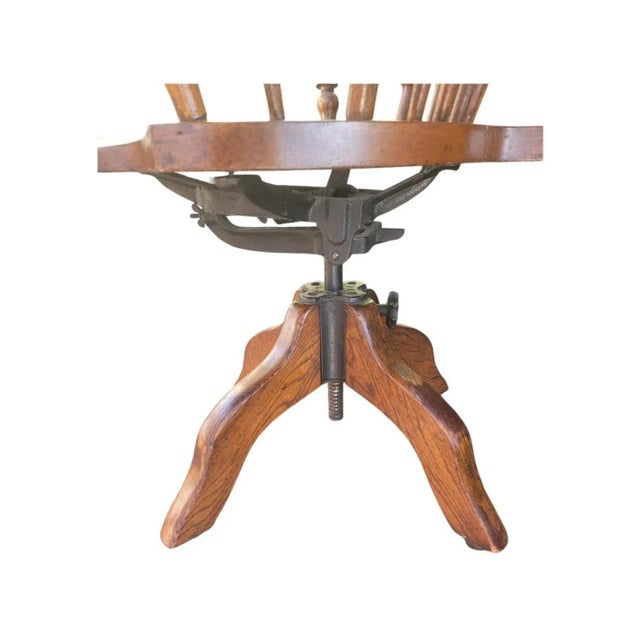 Brown 1930s Fiddleback Oak Windsor Style Tilting and Rolling Desk Chair With Saddle Seat For Sale - Image 8 of 9