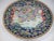 A very large and impressive hand painted porcelain Chinese charger in colors of rose, yellow, deep blue and mint green. It...