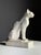 Plaster statue of cat. Origin from France, 20th century. Dimensions: 33h x 26l x 11.5w