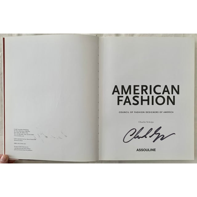 American Fashion, edited and signed by Charlie Scheips. New York: Assouline, 2007. First printing. An enormous survey...