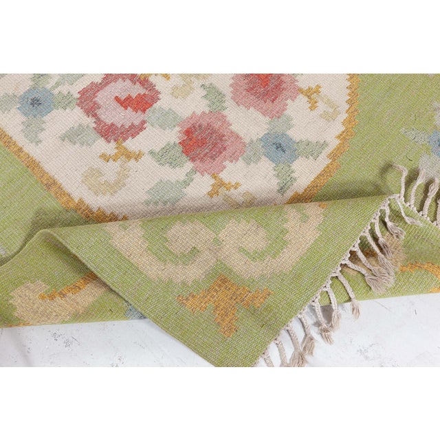 Vintage Swedish Flat Woven Rug by Rakel Carlander Size: 5'6" × 7'8" (167 × 233 cm) A charming example of mid-century...