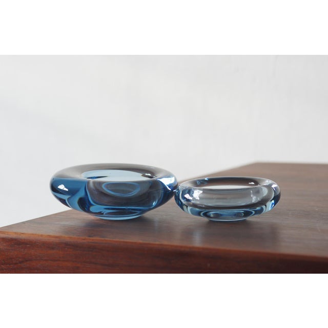 The bowls are iconic works created by Per Lütken, one of the most respected glass masters in the history of the Danish...