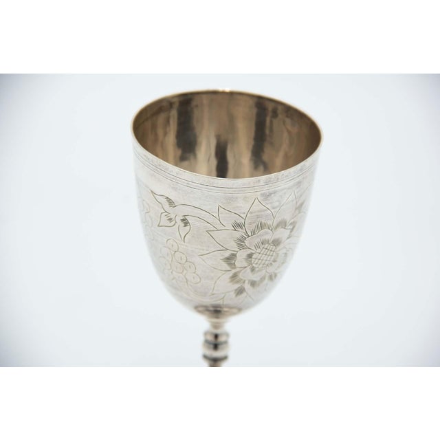 Silver Chalice with Circular Base and Floral Motifs, in Very Good conditions. Designed from 2000 This piece has an...