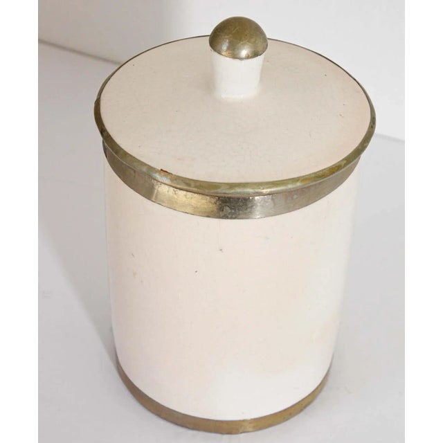 Vintage Moroccan Ceramic Urn with Lid, white crackled ceramic with silver overlaid. Great to use in the kitchen or in the...
