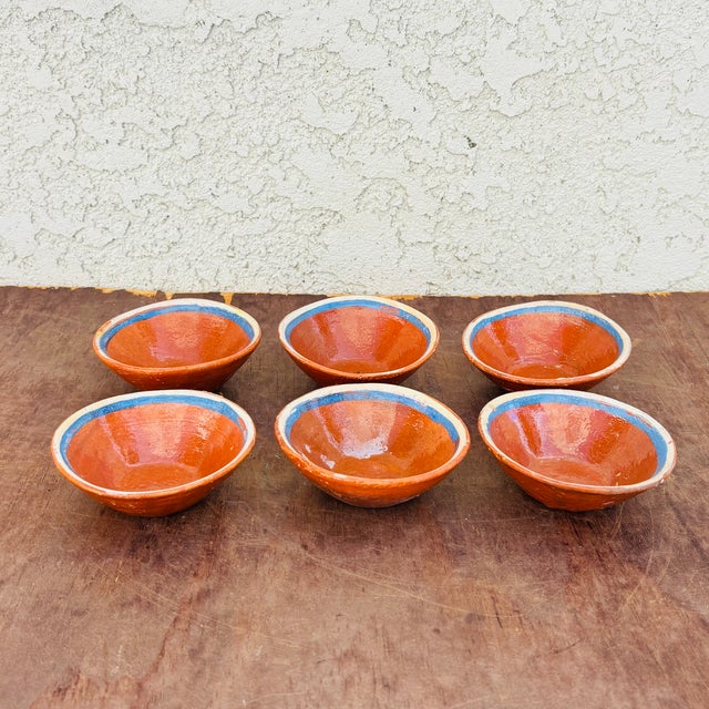 Charming set of six vintage handmade terracotta bowls, believed to be Mexican and dating to the late 20th century. Each...