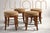 A refined set of four upholstered stools by Swaim, showcasing the brand’s hallmark craftsmanship and understated luxury....