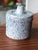 This vintage jar is ready for a variety of 21st Century jobs. Tea Caddy? Cotton ball holder? Paper clips? Sure, sure,...
