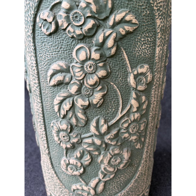 Heavy vintage green and tan raised floral paneled design pottery umbrella stand. Robinson Ransbottom Pottery Co., Ohio,...