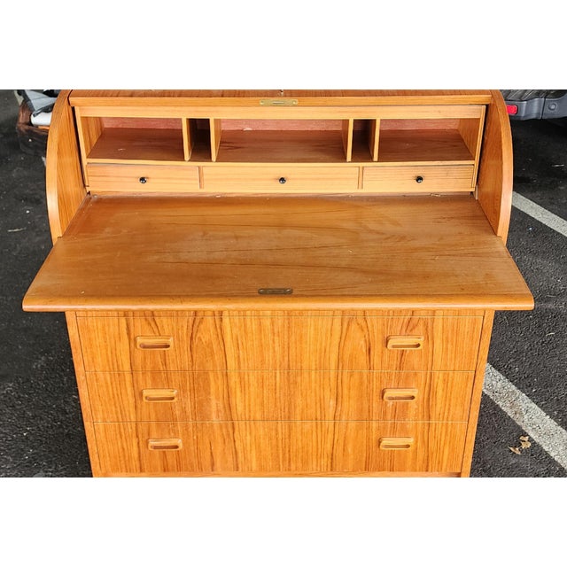 ​This is a very good vintage post MCM Danish Modern ~ Scandinavian teak cylinder roll top desk, c1970s. Single piece...