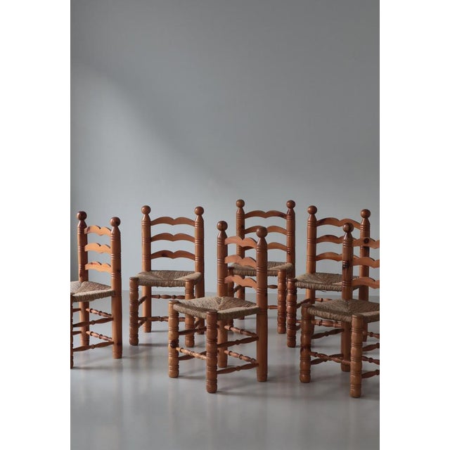Charming set of shaker style dining chairs made in Sweden in the 1970s. The chairs are executed in solid pinewood and the...