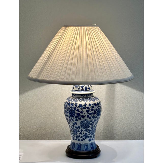 7" in diameter x 19" tall without the harp (24.5" with harp and finial) Wood base. Ceramic body. Harp and finial show...