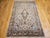 This refined vintage Indian silk rug showcases the elegance and precision of late 20th century hand-knotting traditions at...