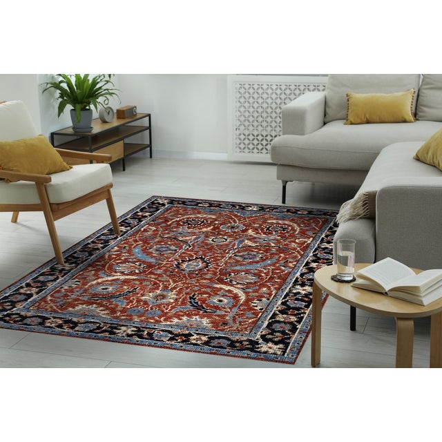 Rustic Oriental Red Hand Knotted Wool Rug, Country of Origin: India. This piece showcases a dense, all-over pattern...