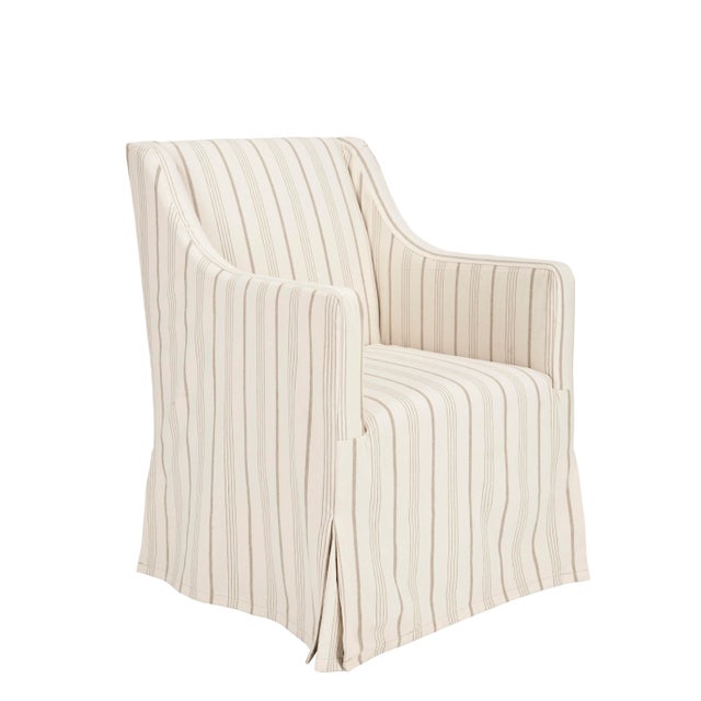 From sh-chic to chic sophistication, the neatly tailored slipcover chair is covered in a over scale mattress ticking...