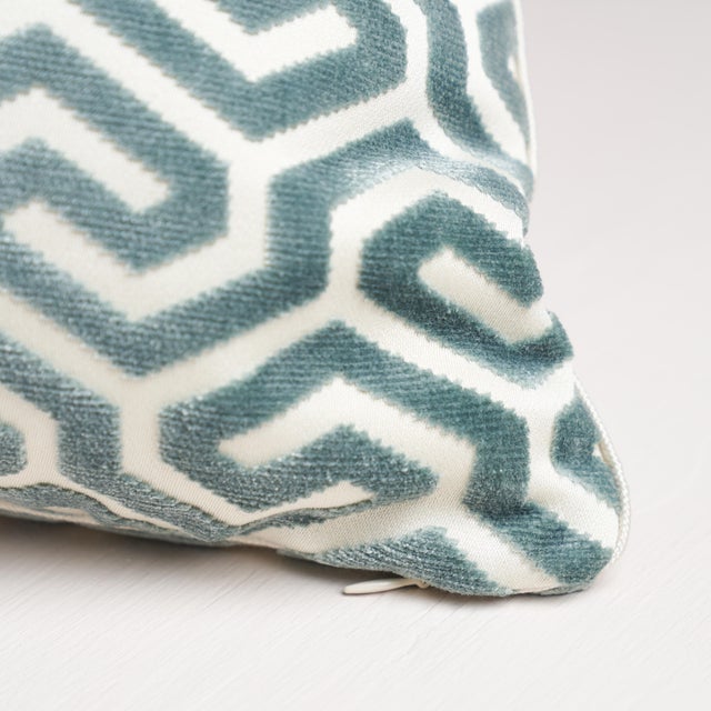 This pillow features Ming Fret Velvet. A velvet interpretation of our popular Ming Fret pattern, this striking design...