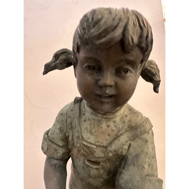 Lovely vintage bronze outdoor statue/fountain of a young girl with pigtails and a watering can.