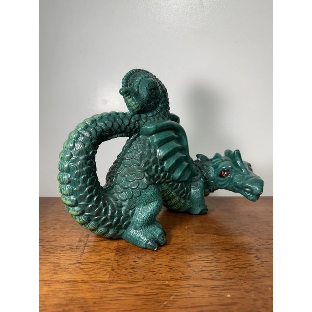 Vintage green dragon figurine featuring detailed scales and wings. A fantasy mythical creature collectible, perfect for...