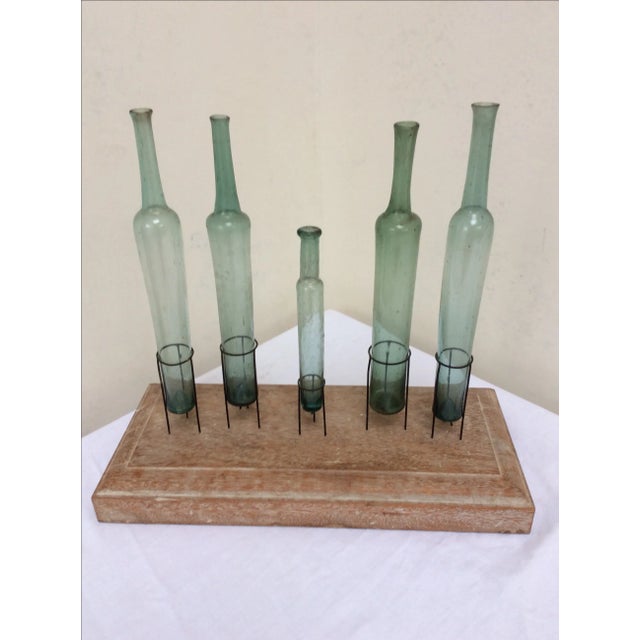 Artfully displayed collection of rare 17th or 18th C Anisette Surfine Glass Bottles invented by Johann Maria...