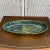 Stunning oblong serving platter. This blue and green folk art pottery serving dish will add gorgeous detail to your home....