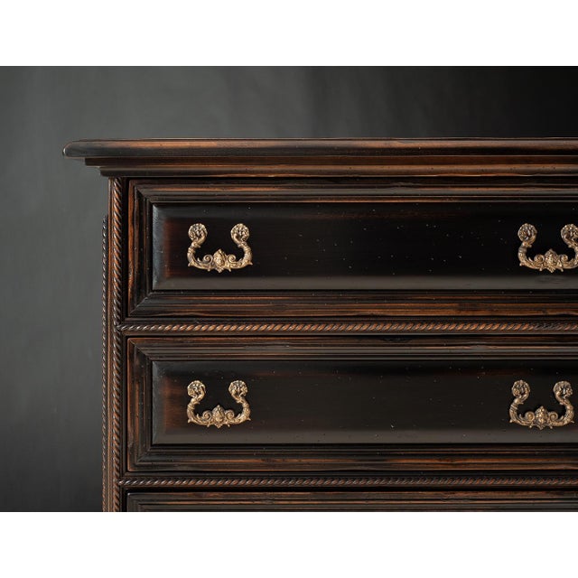 Handcrafted in Italy from solid walnut, this Venetian style nightstand features a rich black finish that highlights its...