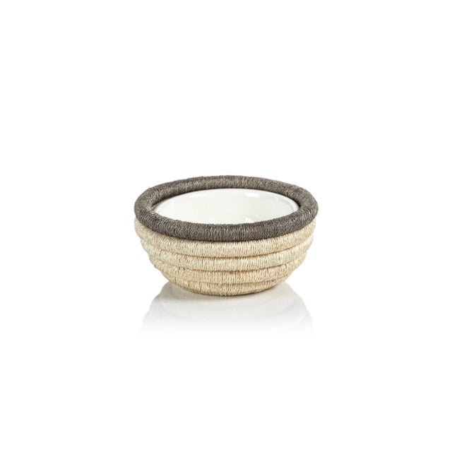Creating beautiful presentation for your favorite condiments, our hand-woven bowl brings natural beauty and texture to the...
