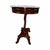 An elegant vintage Neoclassical-style accent table featuring a substantial round white marble top supported by an...