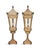 Pair of Italian painted metal standing lanterns, dating to the early 20th century, brings a touch of old-world charm and...