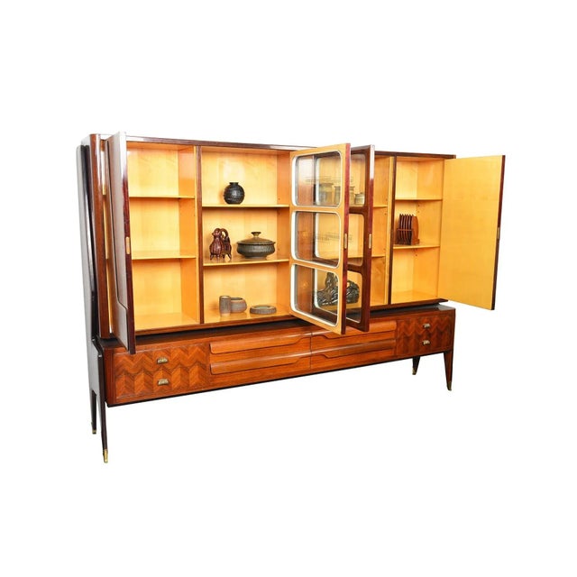 This grand Italian modern bookcase by Vittorio Dassi offers stunning craftsmanship and delightful design details...
