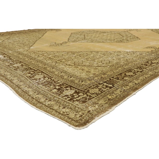 74846 Haji Khalili Distressed Antique Persian Tabriz Rug with Warm, Industrial Style 09'00 x 12'00. This hand-knotted wool...