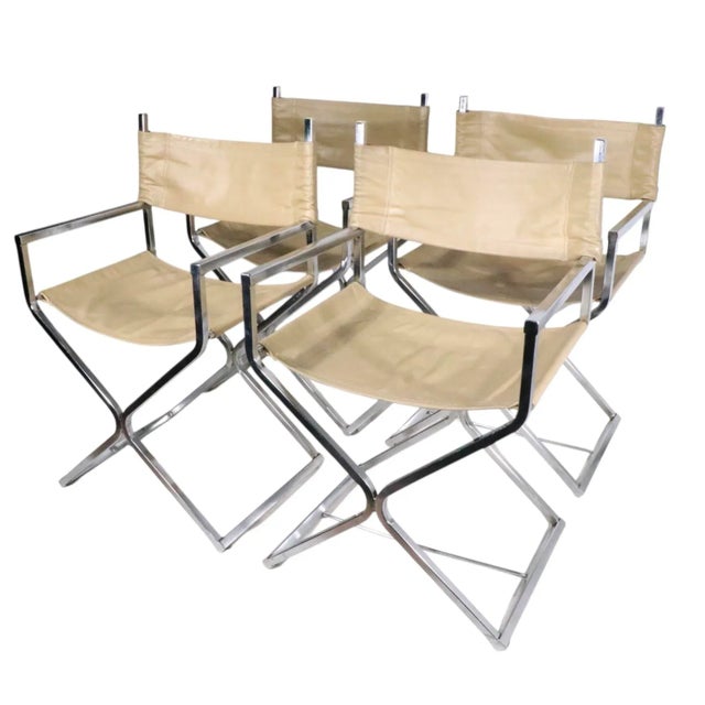 Set of four chrome and vinyl Directors chairs, circa 1970's. All four are in very good, clean, original condition, showing...