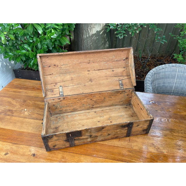 Incredible handmade antique French wooden chest. There are no maker's marks or year stamp. The chest was found in The...