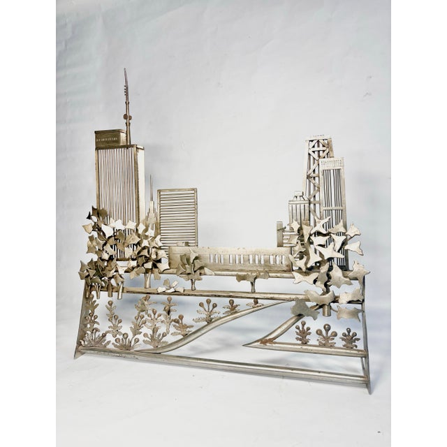 This unique handmade piece of metal handiwork features the iconic Chicago skyline, with depictions of One Prudential Plaza...