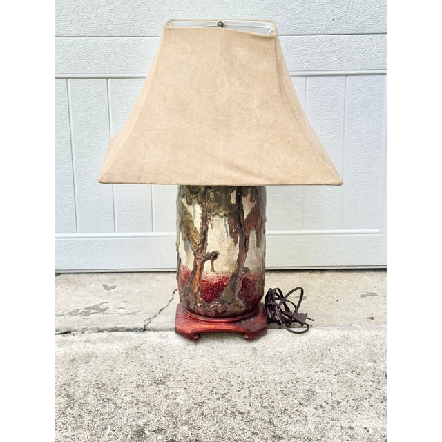 Wonderful vintage table lamp. Handmade pottery base by a Louisiana artist. Features a cypress swamp scene. Rosewood...