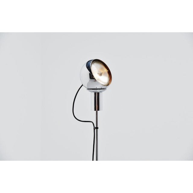 Very nice minimalist floor lamp model 14002 designed by angelo lelli and manufactured by arredoluce, italy, 1966. The lamp...