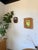 Vintage 1960s wooden mirror with an organic shape. thick frame, hanging hardware on the back. A very attractive piece, in...