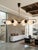 Designed in France in the early 1950s, this chandelier captures a moment when lighting was conceived as both utility and...