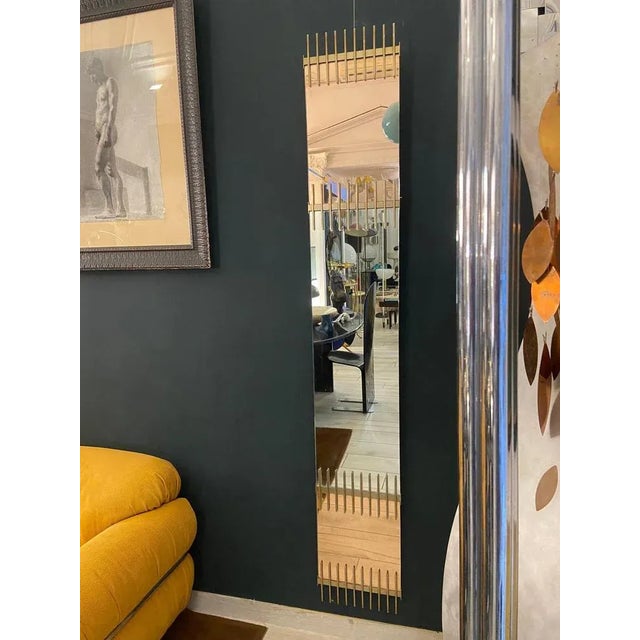 Very rare mirror by Ettore Sottsass, produced by Santambrogio and De Berti in the late 1950s. Pink and clear colored...