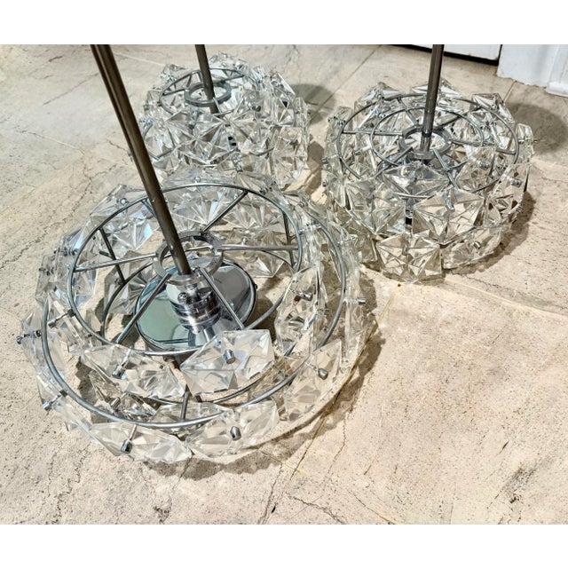 These modernist design chandeliers are from mid 20th century. Each is made to a very high standard and have slightly...