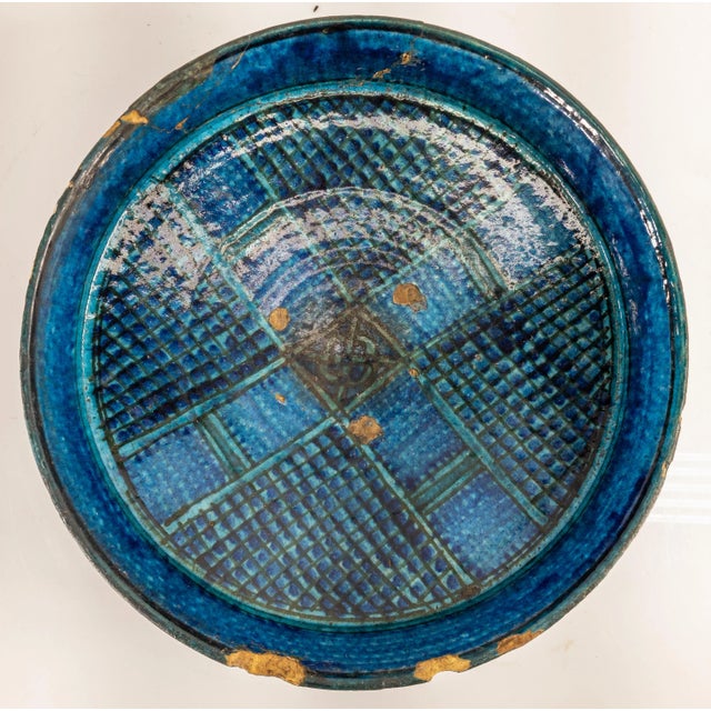 We are offering this beautiful early Kashan ware type bowl. This blue turquoise and black glazed dish is probably from...